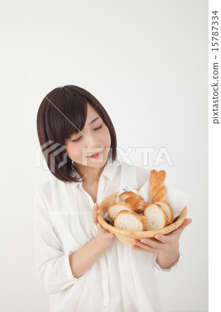 A woman with bread 15787334