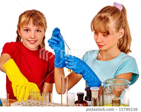 Child in chemistry class. Child in chemistry class. 15790136