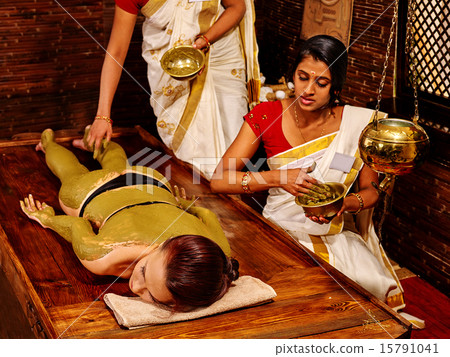Woman having Ayurvedic body  spa massage. 15791041