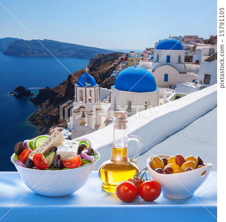 Santorini island with Greek salad in Greece Santorini island with Greek salad in Greece 15791105