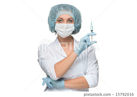Portrait of lady surgeon showing syringe over white background Portrait of lady surgeon showing syringe over white background 15792016