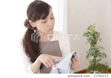 Housewife suffering from dirt on shirt collar Housewife suffering from dirt on shirt collar 15792213