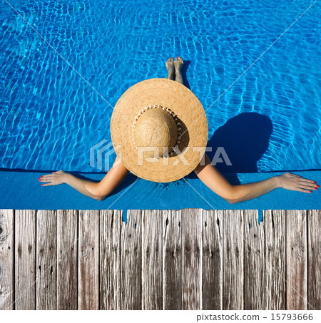Woman at poolside 15793666
