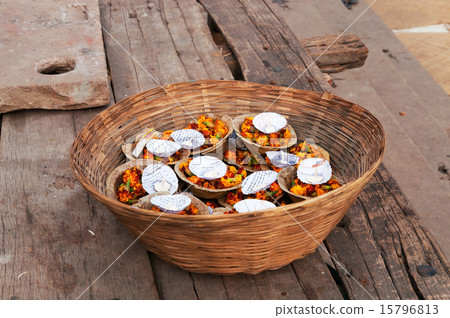 Flowers and candle for Ganga Aarti ritual 15796813