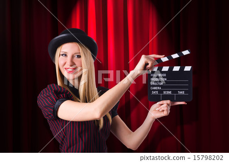 Woman gangster with movie clapper Woman gangster with movie clapper 15798202