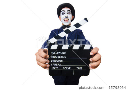 Man with movie clapper isolated on white Man with movie clapper isolated on white 15798934