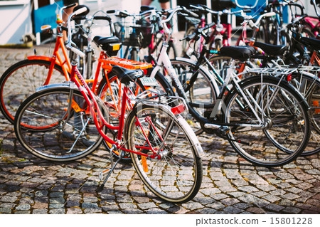 Row Of Parked Bicycles. Bicycle Parking In Big City Row Of Parked Bicycles. Bicycle Parking In Big City 15801228