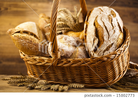 Traditional bread in wicker basket Traditional bread in wicker basket 15802773