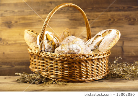 Composition with bread and basket 15802880