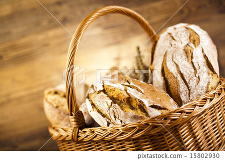 Baked bread in basket, natural colorful tone Baked bread in basket, natural colorful tone 15802930