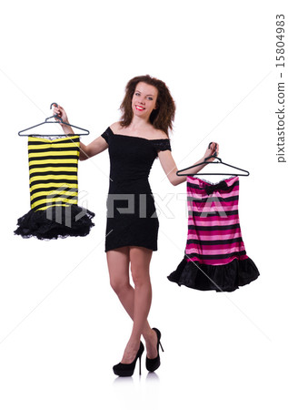 Woman trying to choose dress on white 15804983