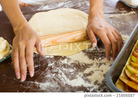 Closeup of woman preparing cakes 15808887