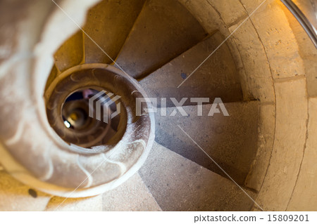 Close up view at stone spiral stairway Close up view at stone spiral stairway 15809201