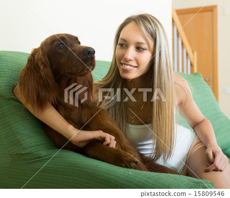 Adult girl with red Irish setter Adult girl with red Irish setter 15809546