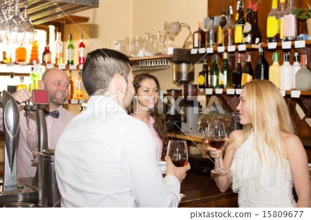 Restaurant visitors drinking wine Restaurant visitors drinking wine 15809677