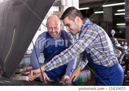 people working at carshop 15810015