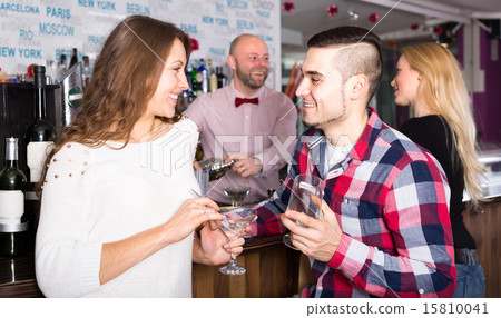 Couple chatting at the bar 15810041