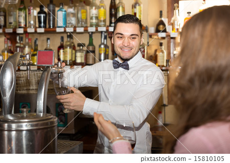 Handsome bartender at bar Handsome bartender at bar 15810105