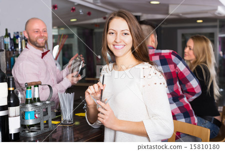 Happy friends drinking and chatting 15810180