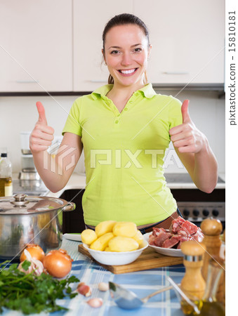 Housewife cooking soup with meat Housewife cooking soup with meat 15810181
