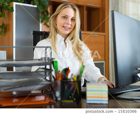 Young businesswoman in office 15810366