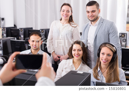 Happy business team making photo 15810801