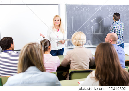 Professionals and coach at training 15810802