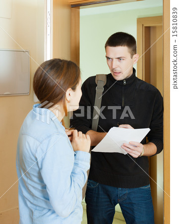 businessman trying to collect money 15810839