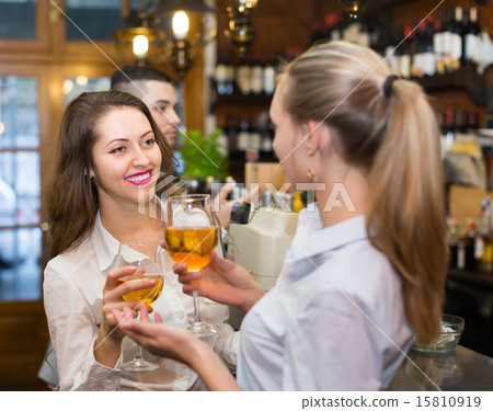 Young happy adults at bar 15810919