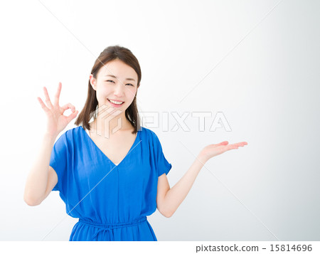 A young woman holding her hand A young woman holding her hand 15814696