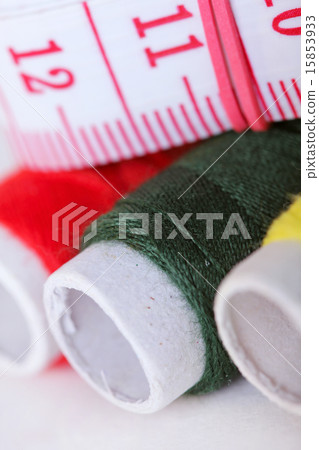 Threads bobbins and measurement tape Threads bobbins and measurement tape 15853933