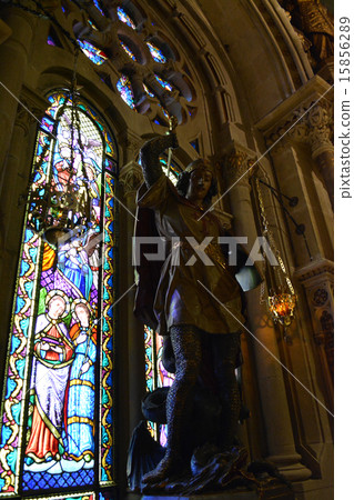 Stained glass and saint statues in the cathedral of Spain Monselat 15856289