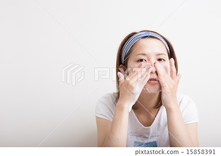 Women washing their face Women washing their face 15858391