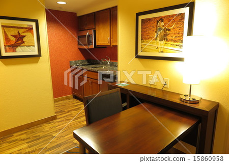 Semi-suite room in an American hotel 15860958