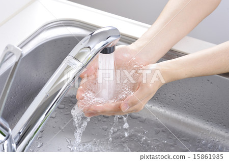 Washing hands with a tap Washing hands with a tap 15861985