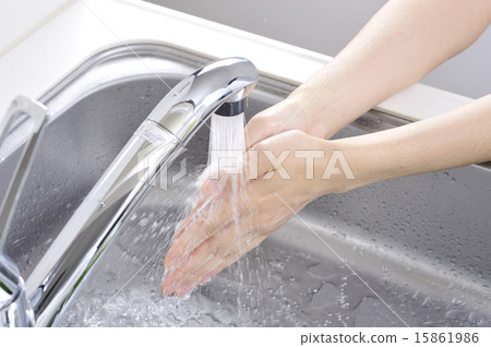 Washing hands with a tap Washing hands with a tap 15861986