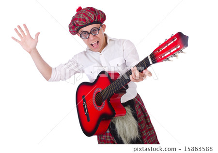 Funny scotsman with guitar on white 15863588