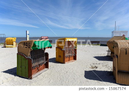 Wicker beach chairs on the beach of the Baltic Sea 15867574