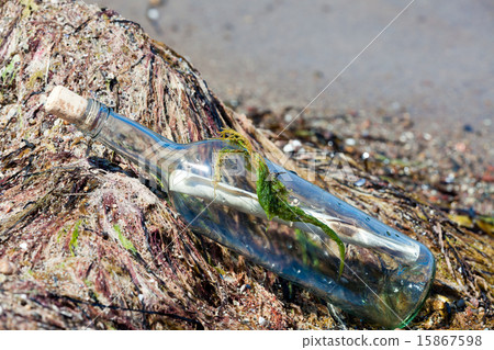 Message in a bottle on the beach Message in a bottle on the beach 15867598