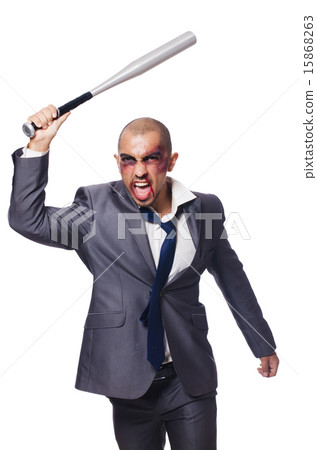 Badly bruised businessman with bat on white 15868263