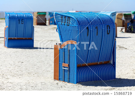 Wicker beach chairs on the beach of the Baltic Sea 15868719