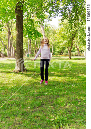 Jumping girl in summer 15869386