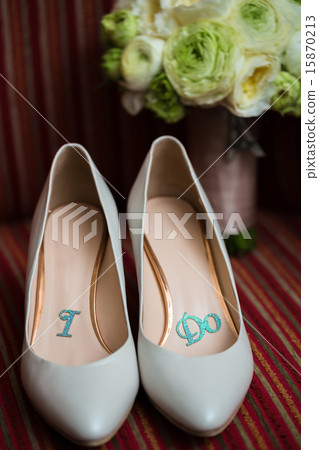 wedding shoes and bouquet  15870213