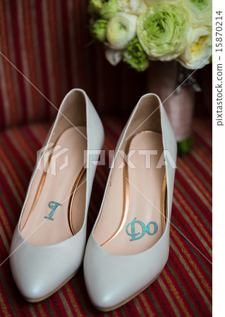 wedding shoes and bouquet  15870214