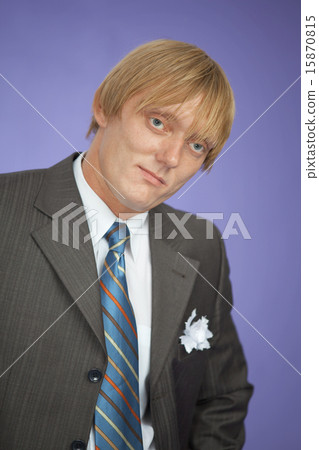 Portrait of young man - groom on violet 15870815