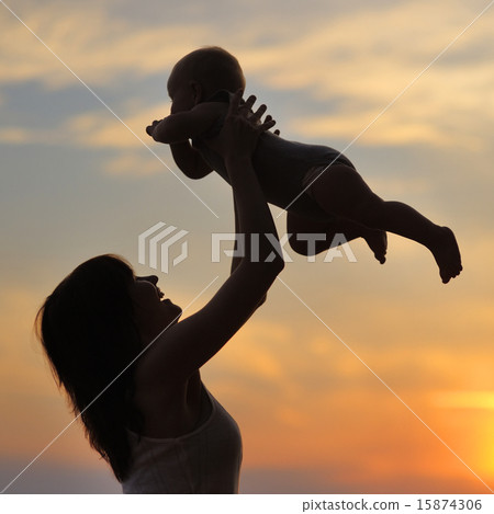 Woman with little baby as silhouette 15874306