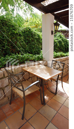 open terrace cafe in the garden, Portugal 15876709