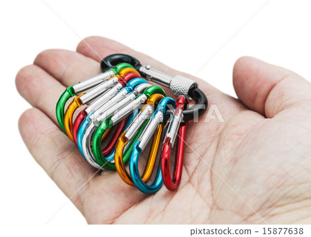 colorful carabiner climbing in hand isolated 15877638