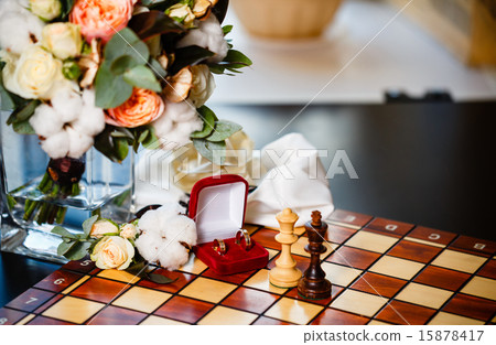Wedding rings and chess 15878417