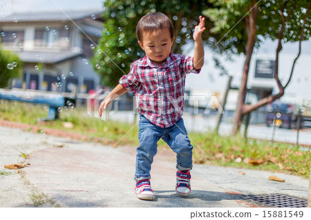 Children playing in the park Children playing in the park 15881549